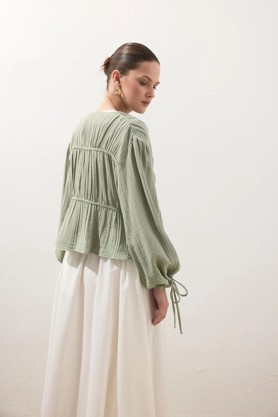 Muslinblus Mandelgrön