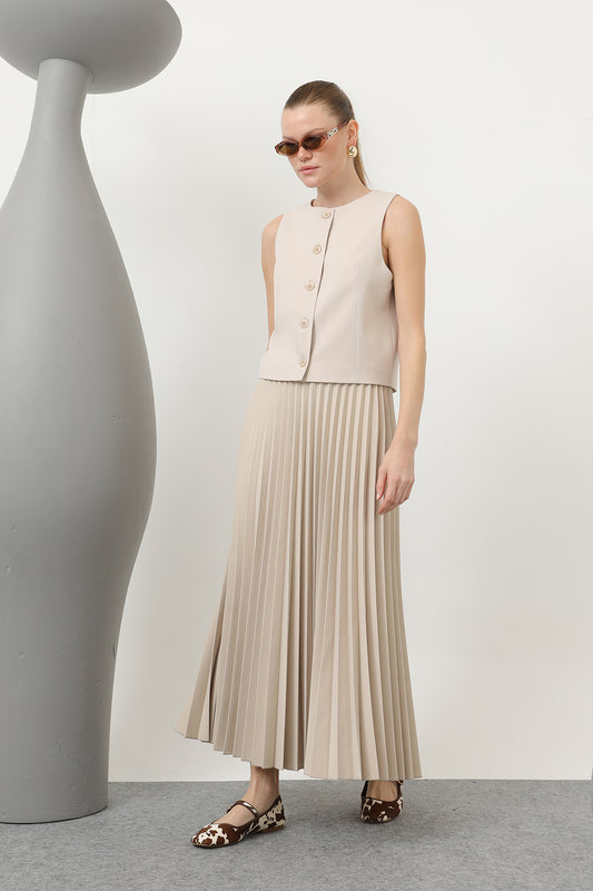 Puane plisserad kjol