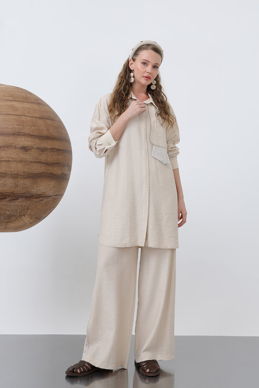 Axelbandage med detaljerad byxa - Beige