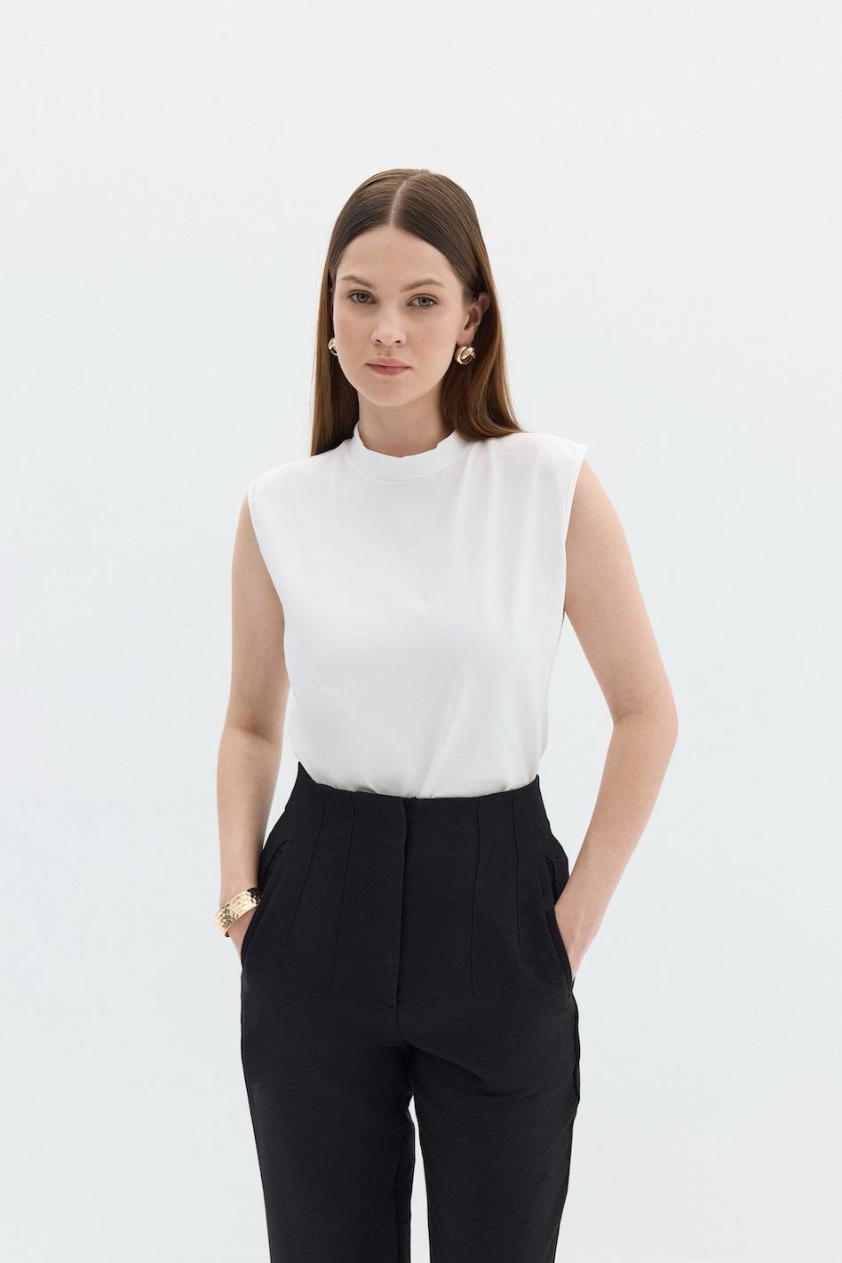 Nollärmad bodysuit vit